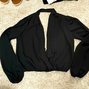 Black long sleeve top. Size S.